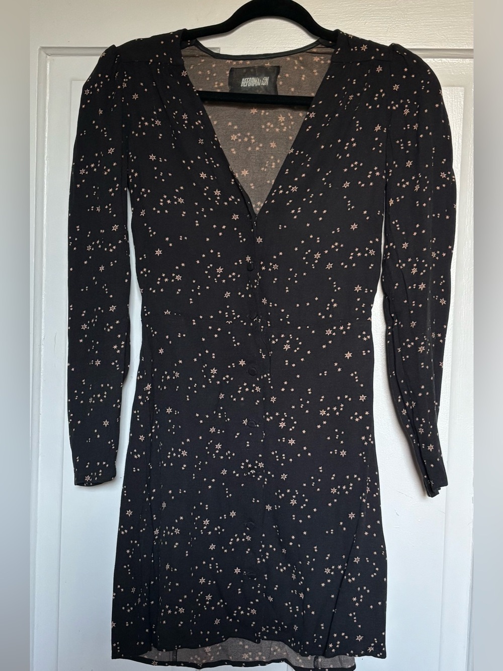 Reformation Black Star-Print Long Sleeve Mini Dress in Cream Stars